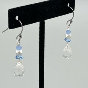 Clear faceted quartz drops with sapphire blue accents on silver wire.